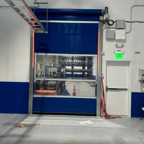 KM Door Company team working on a commercial door installation